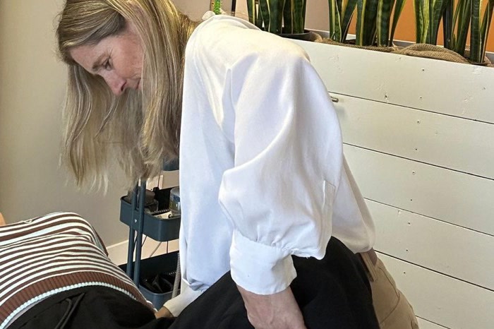 Dr. Shelley performing a chiropractic adjustment