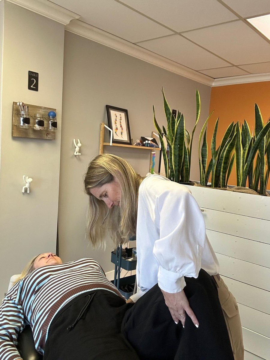 Dr. Shelley performing a chiropractic adjustment