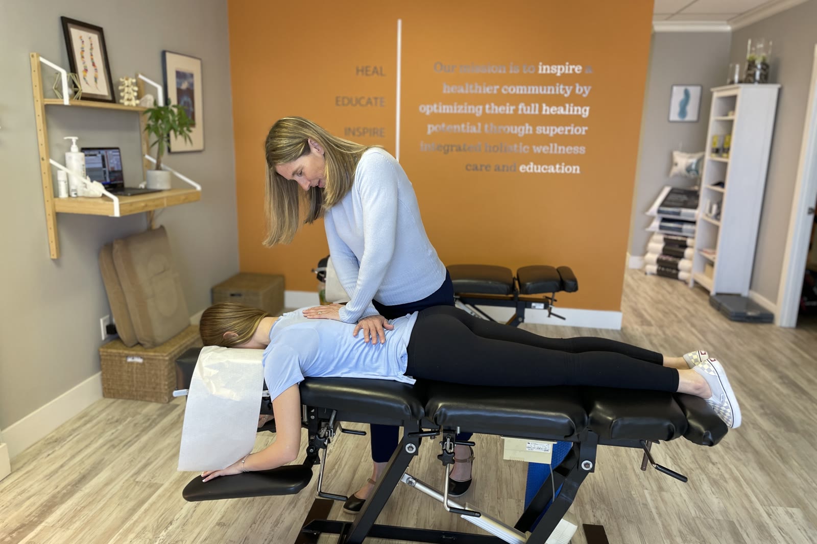 A chiropractic adjustment on the drop table at Synergy Chiropractic